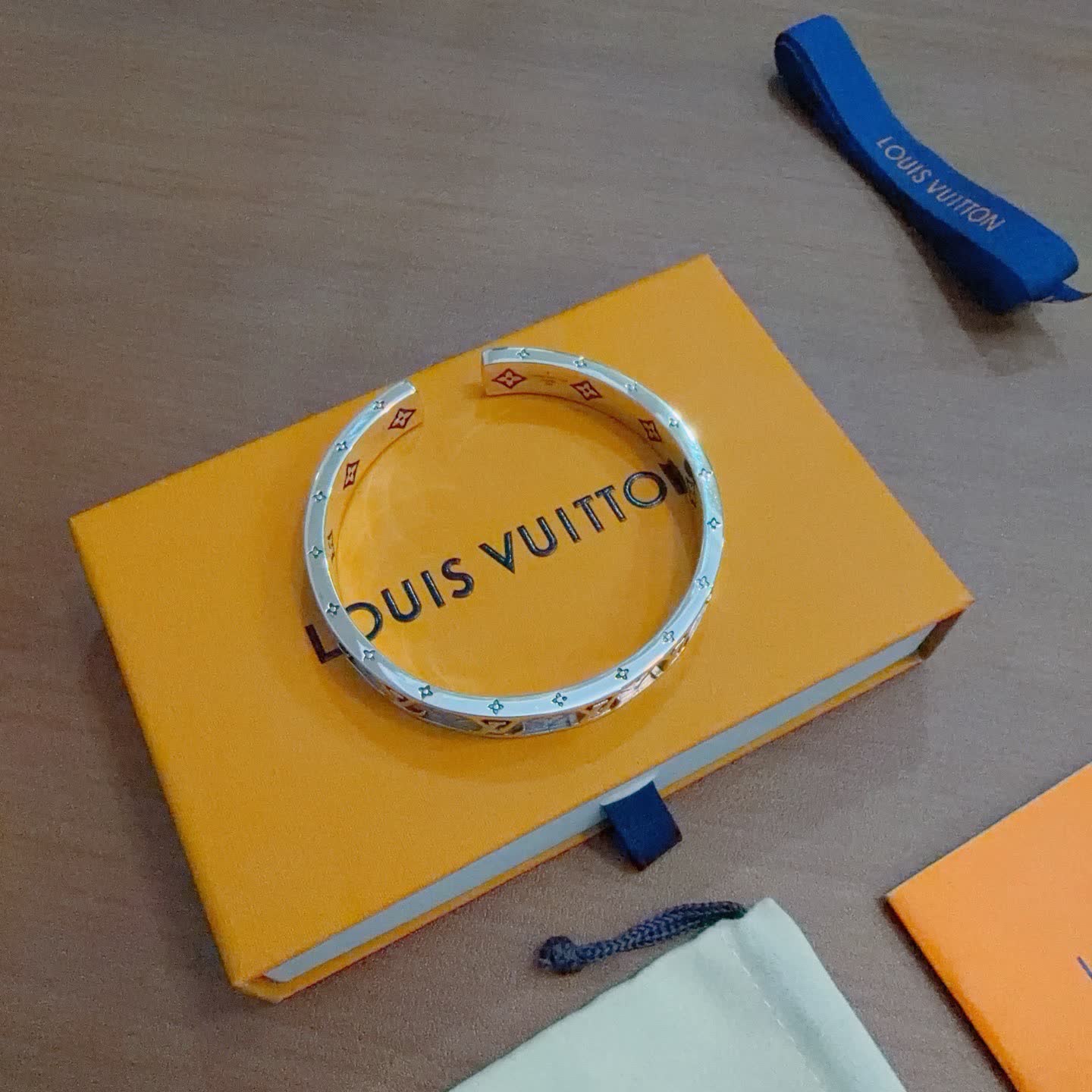 Louis Vuitton Silver Bracelet with Blue and Orange Accents